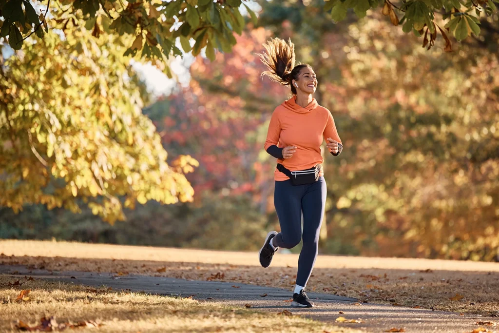 Athletic woman enjoying jogging