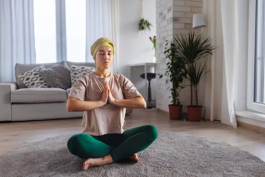 Oncologic patient practicing meditation for pain relief