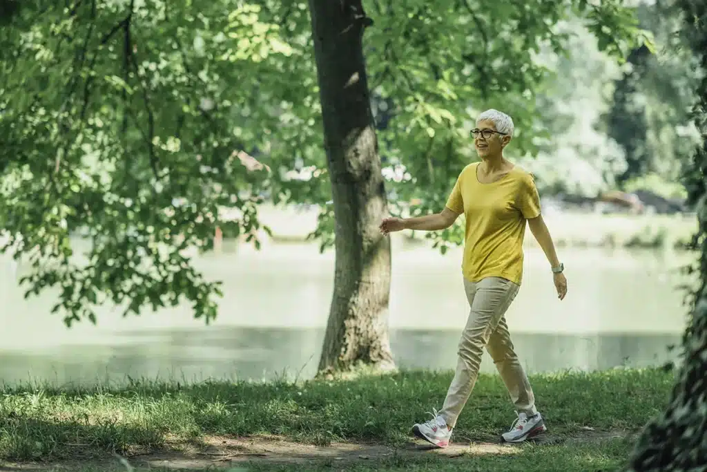 Elderly woman enjoying walking for exercise