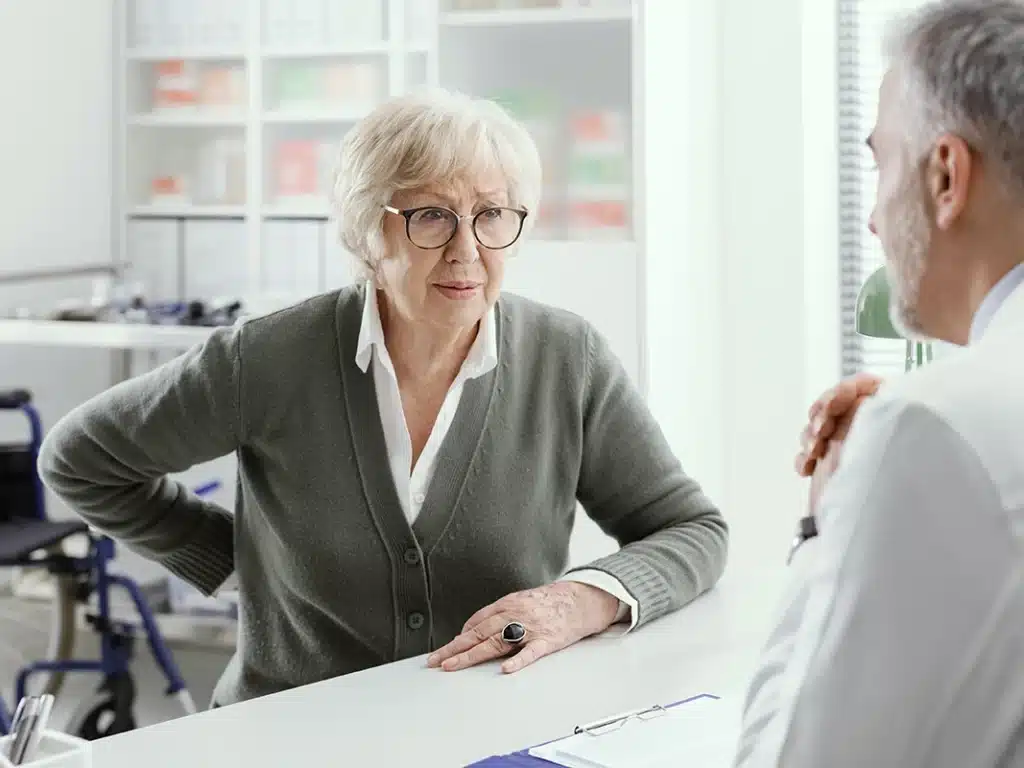 Elderly woman in consultation with the doctor