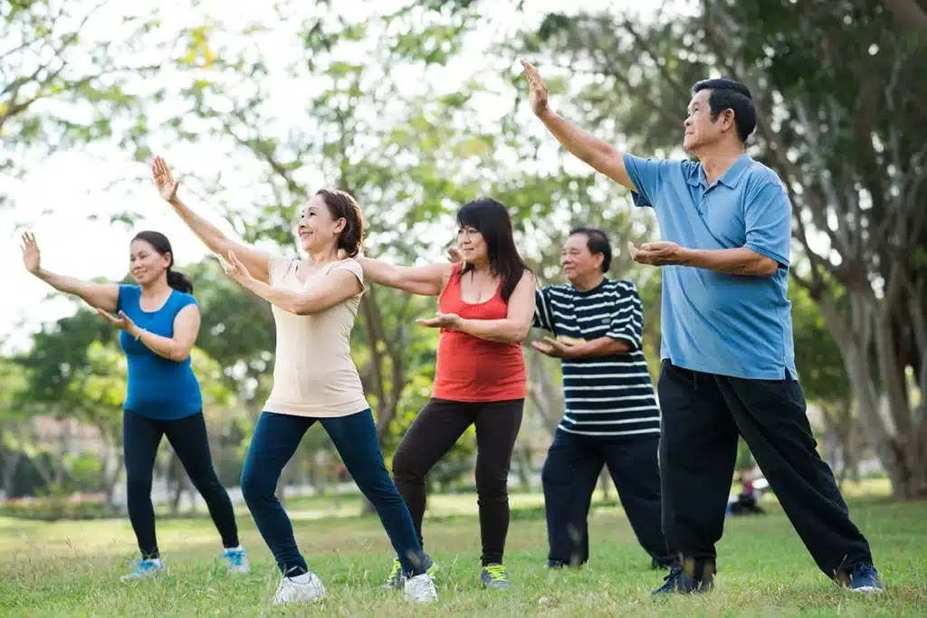 Group of people practicing tai chi