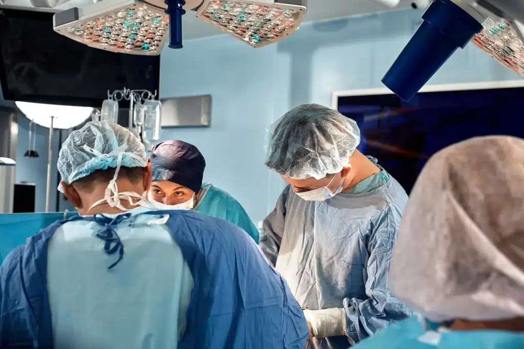Doctors performing a spinal fusion operation