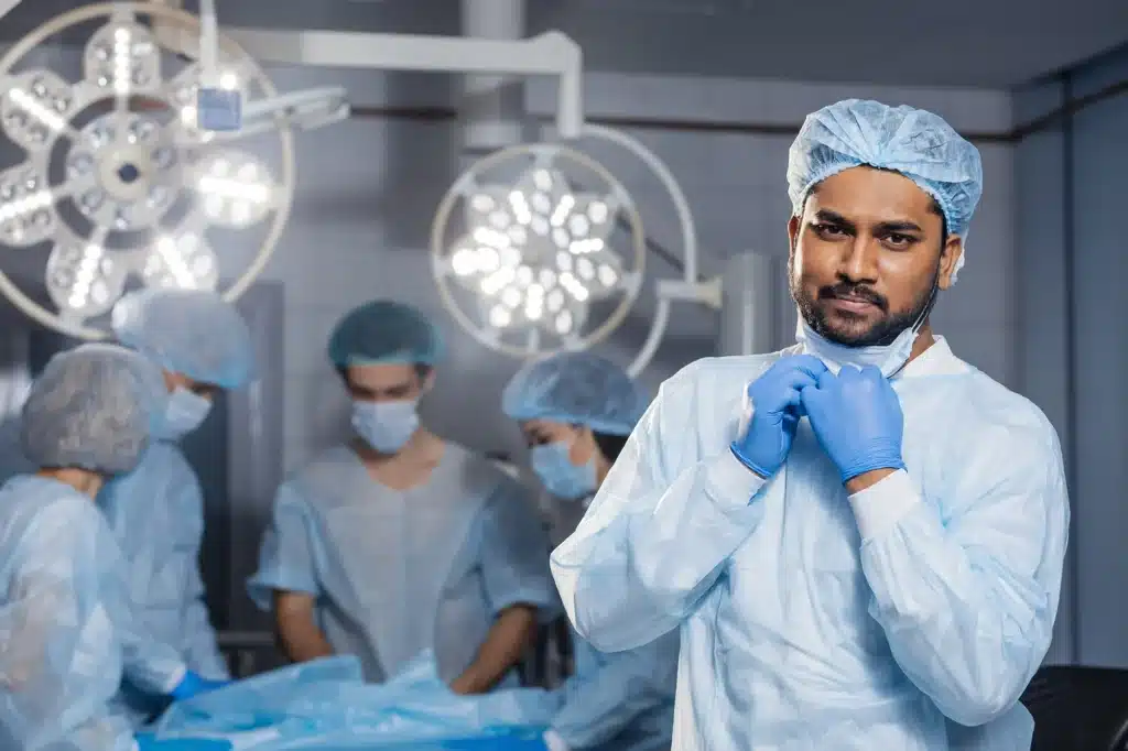 Surgeon Preparing for Surgery with Team in the Operating Room