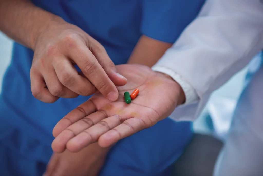 Medical professional explaining the use of opioid medications to a patient.